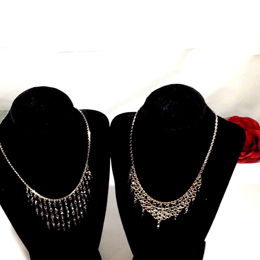 Silver tone necklaces with dangling black stones